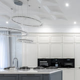 WHITE 4" slim LED gimbal downlight with selectable CCT for sleek, adjustable directional lighting.