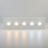 WHITE 4" slim LED gimbal downlight with selectable CCT for sleek, adjustable directional lighting.